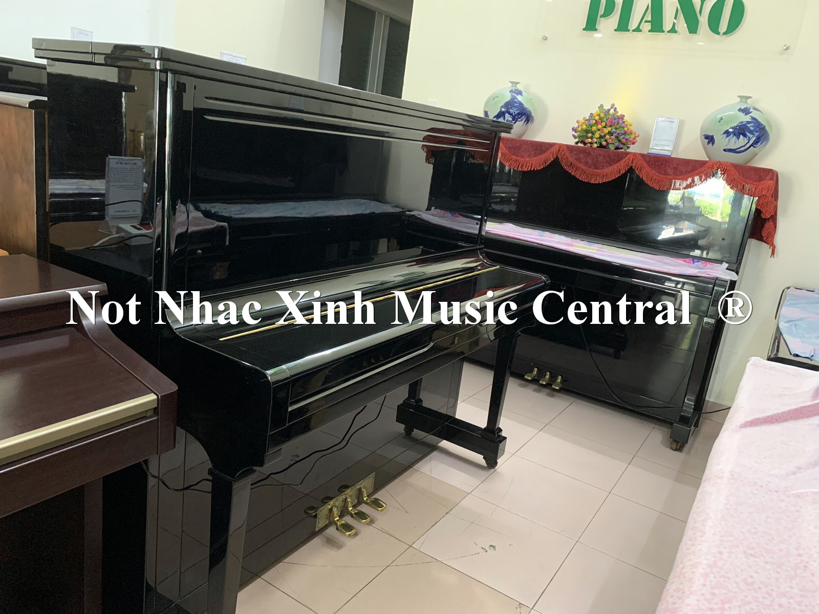 Đàn piano cơ Elington U300E