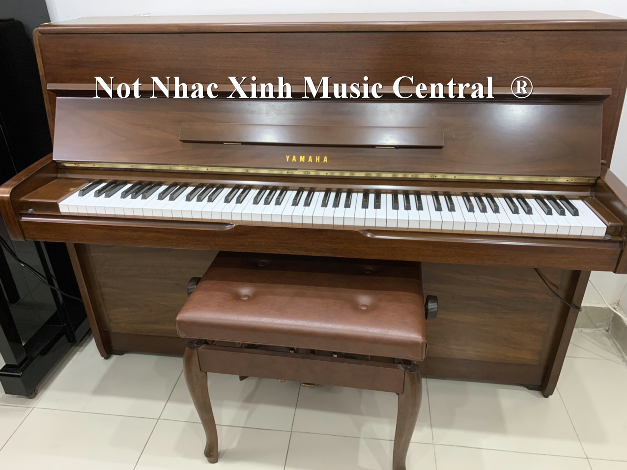 Đàn piano cơ Yamaha M1