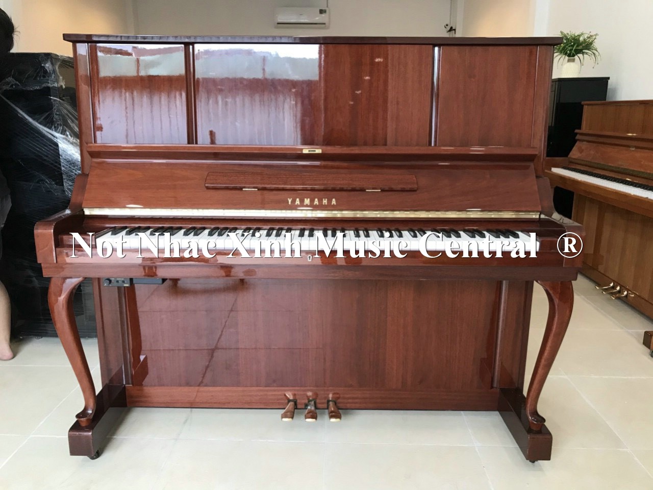 Đàn piano cơ Yamaha W106B